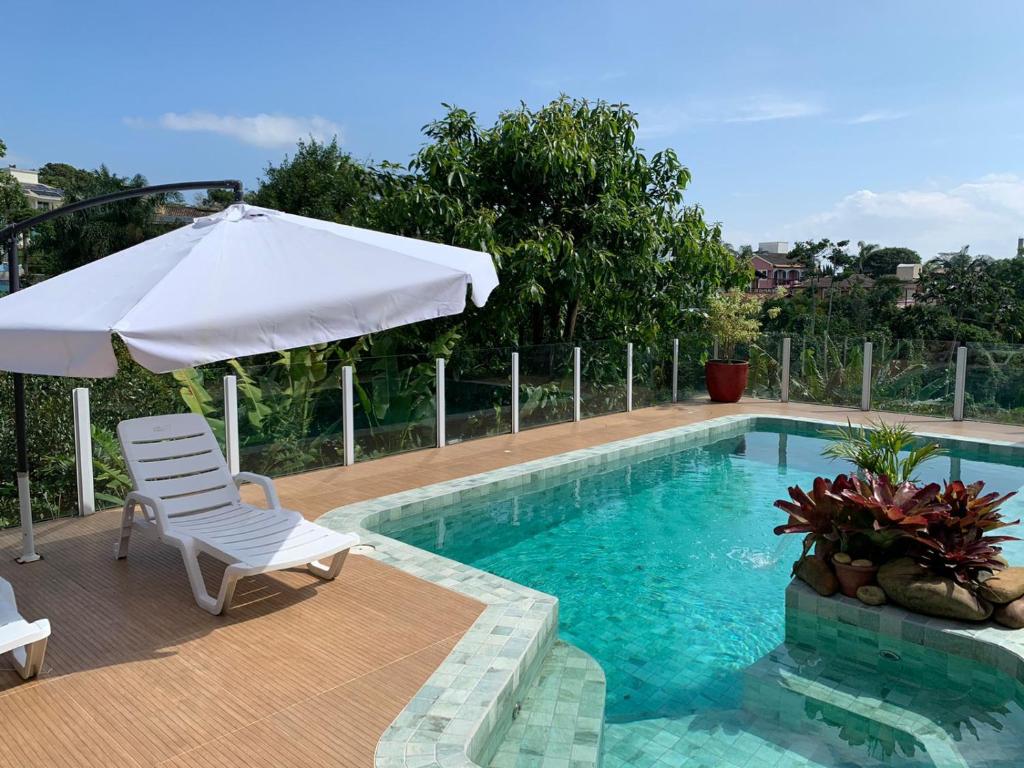 piscina da House Flat Cacupé airbnb em Florianópolis