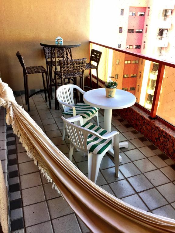 sacada com rede em apartamento uma opção de airbnb na Riviera de São Lourenço