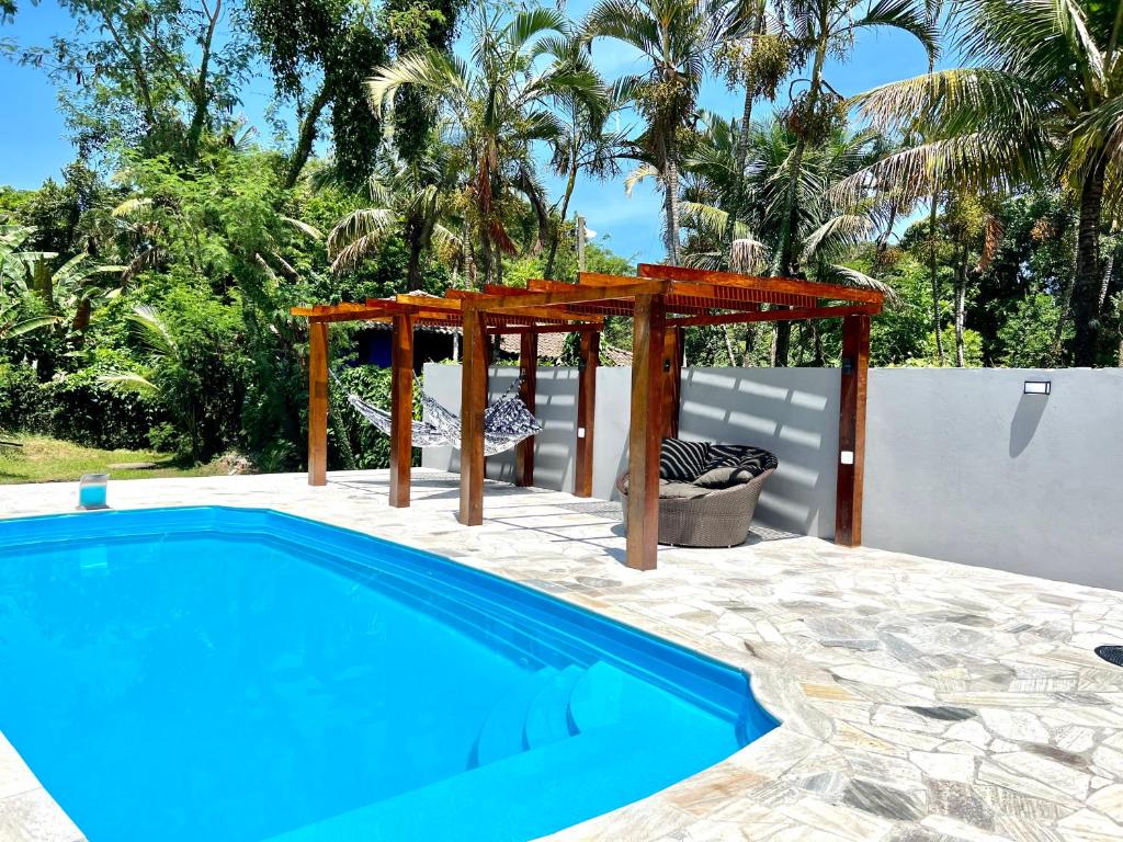 Área de lazer com piscina na Sunset Maresias- Casas e Chalés C1 em Toque-Toque Pequeno.