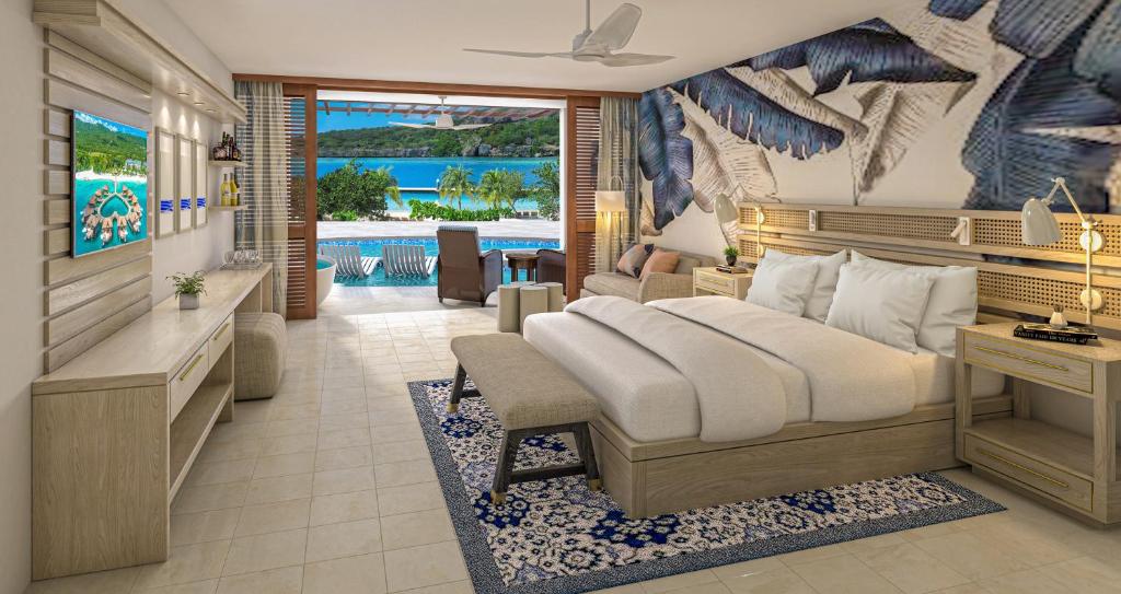 quarto do Sandals Royal Curacao All Inclusive Couples Only com vista para o mar e piscina particular na varanda