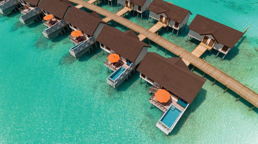 bangalôs iguais no OBLU SELECT Sangeli - Premium All Inclusive with Free Transfers, um dos resorts nas Maldivas