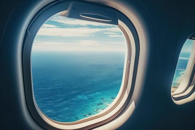 Imagem da janela do avião com vista do mar para ilustrar post sobre como chegar em Aruba.