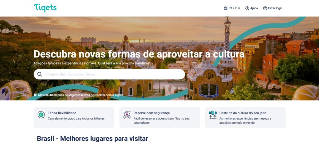 Página inicial do site Tiqets em português com atrações culturais, barra de pesquisa e opções de flexibilidade, segurança e acesso móvel. A imagem ilustra o post que explica se o Tiqets é confiável.
